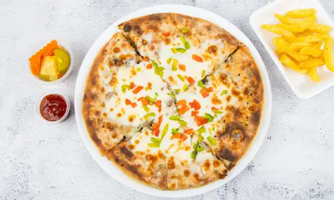 Alexandrian Hawawshi (mozzarella topping) حواوشي اسكندراني (مضاف إليه موزاريلا)